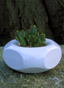 cast iron and enamelled planter by mark pedro de la torre